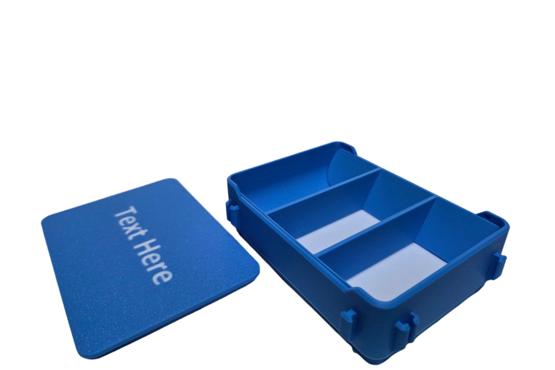 Blue plastic box with compartments on a white background