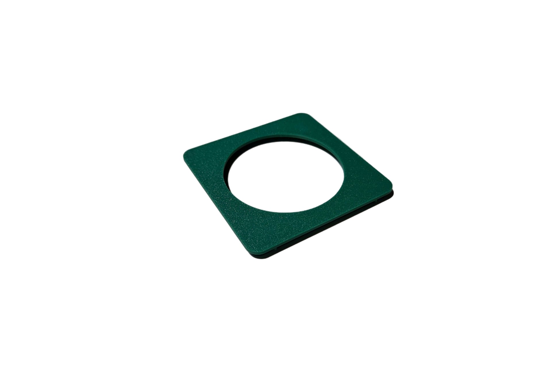 Green square with a circular cutout on a white background